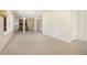 Large basement with a fireplace and white painted walls at 2210 Leafmore Dr, Decatur, GA 30033