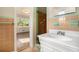 Bathroom features tiled shower, vintage tile and updated vanity at 2210 Leafmore Dr, Decatur, GA 30033