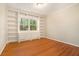 Bright bedroom features a built in bookcase with a large window at 2210 Leafmore Dr, Decatur, GA 30033