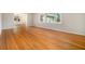 Open concept living room featuring hardwood floors and ample natural light at 2210 Leafmore Dr, Decatur, GA 30033