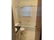 This bathroom features a shower over tub with tile surround and a classic vanity at 1150 Orchard Way, Roswell, GA 30075