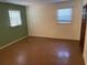 Bedroom with two windows for natural light and closet for storage at 1150 Orchard Way, Roswell, GA 30075
