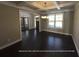 Dining room featuring hardwood floors and a large window providing natural light at 13015 Fox Rd, Alpharetta, GA 30005