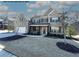Beautiful two-story brick home featuring a manicured front lawn, black shutters, and a two-car garage at 13015 Fox Rd, Alpharetta, GA 30005