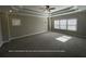 Large primary bedroom with trey ceiling and lots of natural light at 13015 Fox Rd, Alpharetta, GA 30005