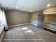 Spacious media room featuring carpet and natural light at 13015 Fox Rd, Alpharetta, GA 30005