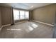 Spacious media room featuring carpet and natural light at 13015 Fox Rd, Alpharetta, GA 30005