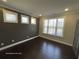 Office with three windows providing lots of natural light and hardwood floors at 13015 Fox Rd, Alpharetta, GA 30005