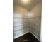 Walk-in pantry with wire shelving for optimal storage at 13015 Fox Rd, Alpharetta, GA 30005