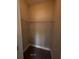 Walk-in closet with shelves and carpeted floor provides ample storage at 13015 Fox Rd, Alpharetta, GA 30005