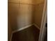 Walk-in closet with shelves and carpeted floor provides ample storage at 13015 Fox Rd, Alpharetta, GA 30005