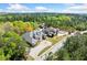 Aerial view of a home showcasing its impressive architecture and expansive surroundings at 1660 Norris Landing Dr, Snellville, GA 30039
