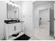 Stylish bathroom featuring a black countertop vanity and modern finishes at 1660 Norris Landing Dr, Snellville, GA 30039