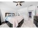 Spacious main bedroom features plush carpeting and an ensuite bathroom at 1660 Norris Landing Dr, Snellville, GA 30039