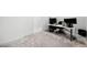 Bright home office space featuring neutral walls and plush carpeting at 1660 Norris Landing Dr, Snellville, GA 30039