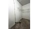 Unfinished basement area with concrete flooring and a utility access point, ready for customization at 185 Maple Wood Dr, Lawrenceville, GA 30046