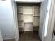 Closet with bi-fold doors and shelving at 185 Maple Wood Dr, Lawrenceville, GA 30046