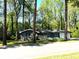 Charming single-story home with well-maintained lawn and a driveway at 185 Maple Wood Dr, Lawrenceville, GA 30046