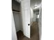 Hallway with carpet flooring leading to closet and rooms at 185 Maple Wood Dr, Lawrenceville, GA 30046