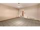The room has tile floors and light peach colored walls, providing a blank canvas at 5026 Daniel Mill Rd, Winston, GA 30187