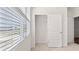 Bright bedroom features a closet and plenty of natural light from the window at 604 Lobelia Way, Locust Grove, GA 30248