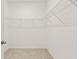 Spacious walk-in closet with wire shelving at 604 Lobelia Way, Locust Grove, GA 30248