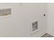 Convenient laundry room hookups with neutral walls and clean finishes at 604 Lobelia Way, Locust Grove, GA 30248