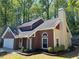 Charming single-Gathering home featuring brick and vinyl siding with a well-manicured lawn at 1241 Baldridge Dr, Lawrenceville, GA 30044