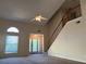Welcoming foyer with high ceilings, a staircase, and natural light pouring through the front door at 1241 Baldridge Dr, Lawrenceville, GA 30044