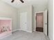 Bedroom with a ceiling fan and a built-in shelf at 160 Avery Landing Way, Canton, GA 30115