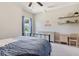 This cozy bedroom features neutral walls, soft carpet, and a writing desk at 160 Avery Landing Way, Canton, GA 30115