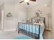 Bright bedroom boasts a unicorn wall decor, plush bedding, and soft carpeting at 160 Avery Landing Way, Canton, GA 30115