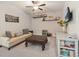 Inviting living room features a comfortable couch, television, and a cozy space for entertaining at 160 Avery Landing Way, Canton, GA 30115