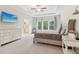 Spacious main bedroom features trey ceiling, fan, large windows, and a sitting area at 160 Avery Landing Way, Canton, GA 30115