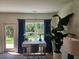 Bright home office with a large window, stylish desk, chair, and view of the outdoors at 2690 Ne Almand Ln, Conyers, GA 30013