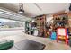 Spacious garage with storage shelves and overhead lighting at 500 Katherines Cv, Mcdonough, GA 30253