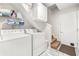 Well-lit laundry room with modern washer and dryer at 500 Katherines Cv, Mcdonough, GA 30253