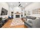 Sun-drenched living room with fireplace at 500 Katherines Cv, Mcdonough, GA 30253