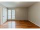 Bedroom with natural light, wood flooring, and a closet creates a cozy and functional space at 5307 Jay Nw Way, Lilburn, GA 30047