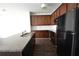 Modern kitchen with granite countertops, ample cabinet space, and stainless steel appliances at 5829 Taka Ln, Lithonia, GA 30038