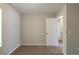 Cozy bedroom features neutral walls and carpet floors at 6205 Leverett Dr, Lithonia, GA 30038