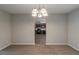 Cozy dining room featuring plush carpet and direct access to the kitchen at 6205 Leverett Dr, Lithonia, GA 30038