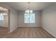 Charming dining room featuring plush carpet and a stylish chandelier at 6205 Leverett Dr, Lithonia, GA 30038