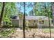 This single Gathering home features a large backyard, offering ample space for outdoor activities and relaxation at 1665 Dunbarton Dr, Lithonia, GA 30058