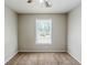 Neutral bedroom with a window providing natural light and a ceiling fan for comfort at 1665 Dunbarton Dr, Lithonia, GA 30058