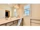 Bathroom featuring double sinks, modern fixtures, and natural light, providing a clean and bright space at 1835 Wellston Dr, Lawrenceville, GA 30043