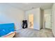 Bedroom with neutral colored walls, neutral carpet, and golf equipment visible at 1835 Wellston Dr, Lawrenceville, GA 30043