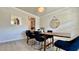 Dining room featuring modern decor, and a view to the adjacent pantry and kitchen at 1835 Wellston Dr, Lawrenceville, GA 30043