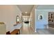 Bright foyer featuring light hardwood floors, neutral walls, and an open view to the living area at 1835 Wellston Dr, Lawrenceville, GA 30043