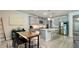 Open kitchen with stainless steel appliances, a center island, and eat in breakfast area at 1835 Wellston Dr, Lawrenceville, GA 30043